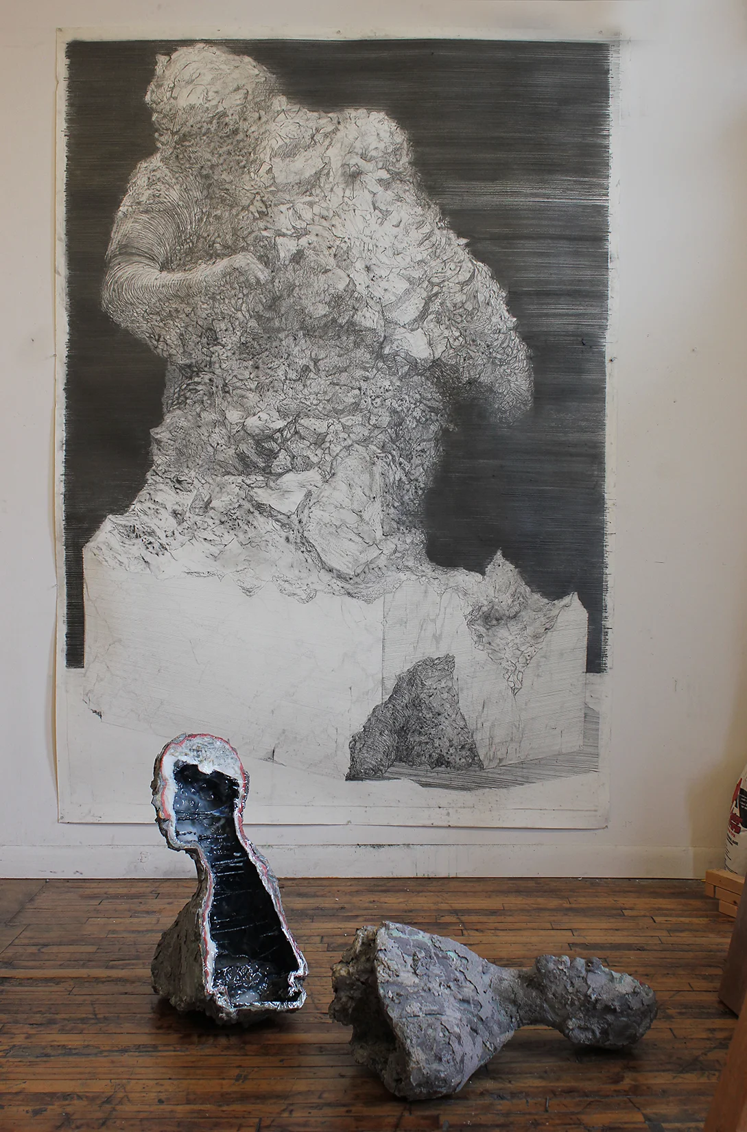 Top: Unfinished Monument II , 2018, graphite on paper, 58 x 98 inches. Bottom: Geode (Michael Jordan), gypsum, resin, metal powder, pigment.