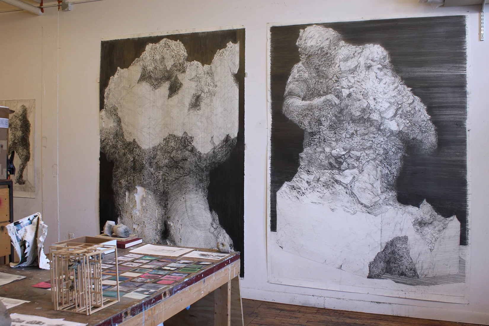 Left: Unfinished Monument I, 2018, graphite on paper, 58 x 98 inches. Right: Unfinished Monument II , 2018, graphite on paper, 58 x 97 inches. 
