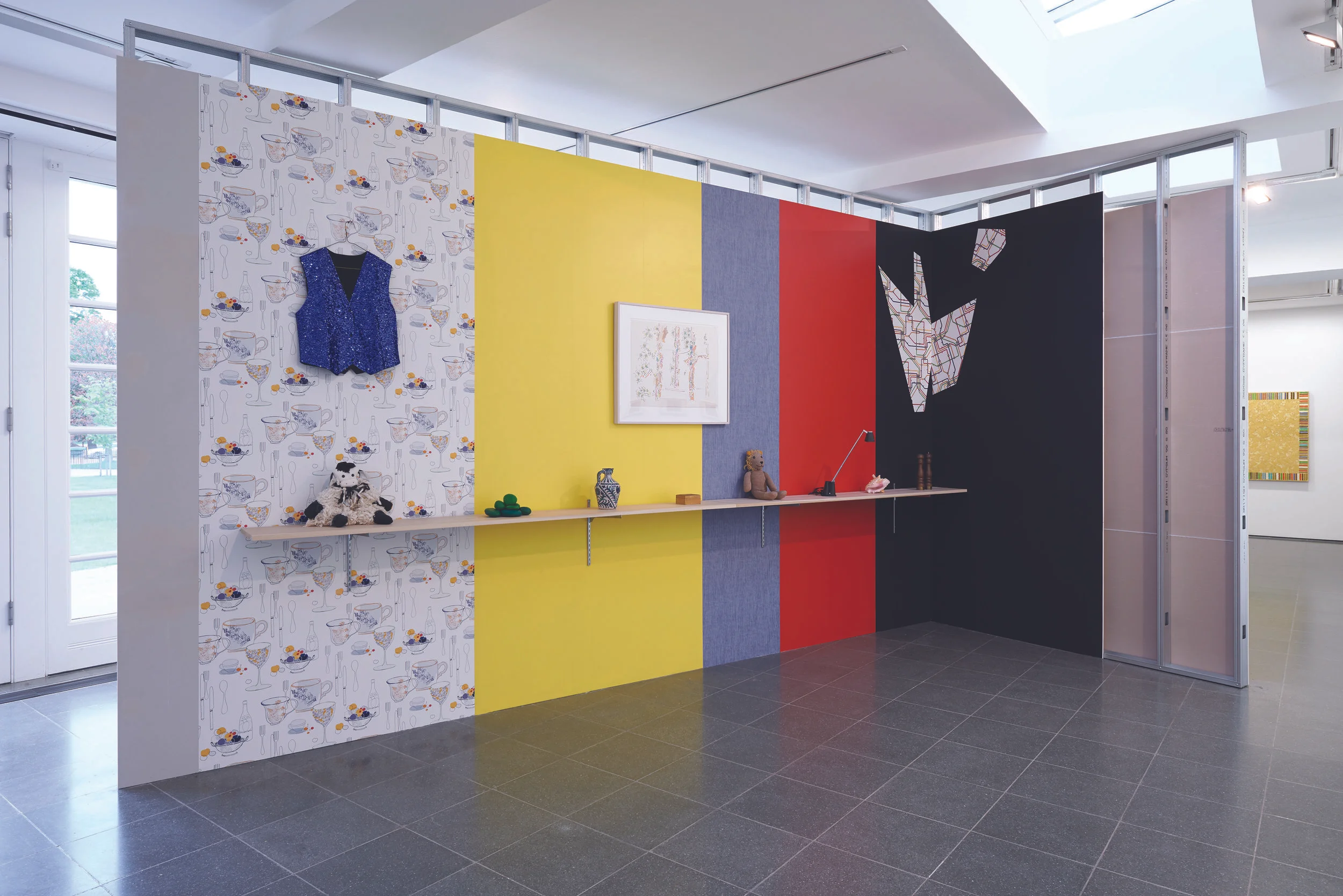 Display #6B - with Gordon Matta-Clark , 1979/2014, Galvanized steel studs, plasterboard, wallpaper sections, wood shelf, metal brackets, polyester and glitter vest on metal hanger, stuffed cotton lamb, painted stones, ceramic vase, wooden box, stuffed cotton lion, metal desk lamp, conch, wooden salt and pepper shakers, Dimensions variable, Photo: Hugo Glendinning. Courtesy the artist and Tanya Bonakdar Gallery, New York / Los Angeles