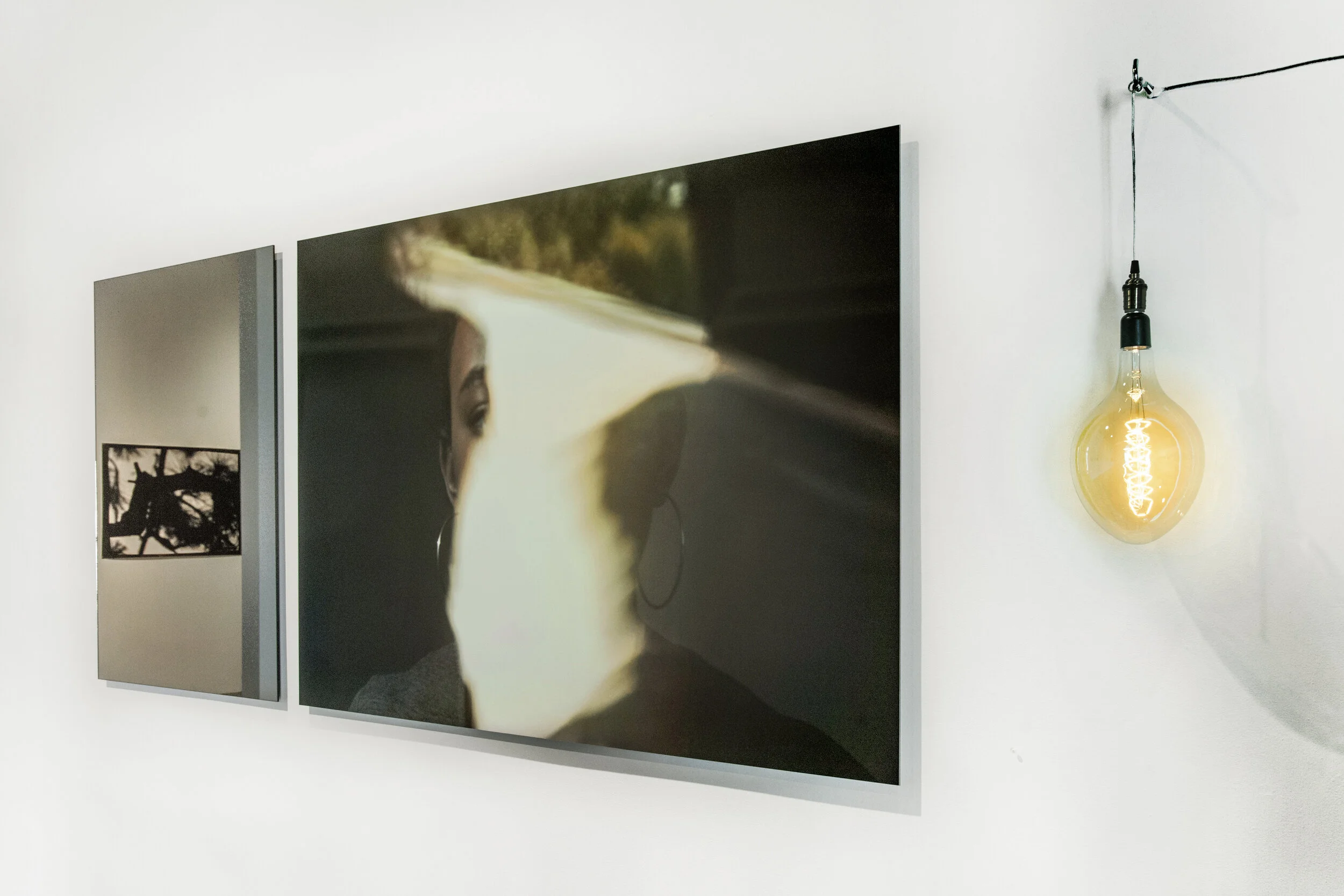 Triptych Sorhan , Bronze mirror 34x47in, Gyclee print on dibond, 65x34in, light bulb, 2018