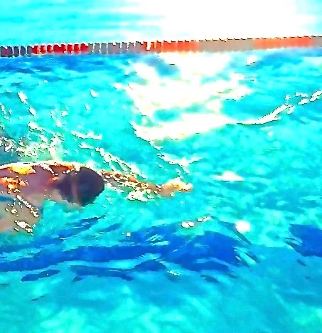 'SUN BATHED SWIMMER'
