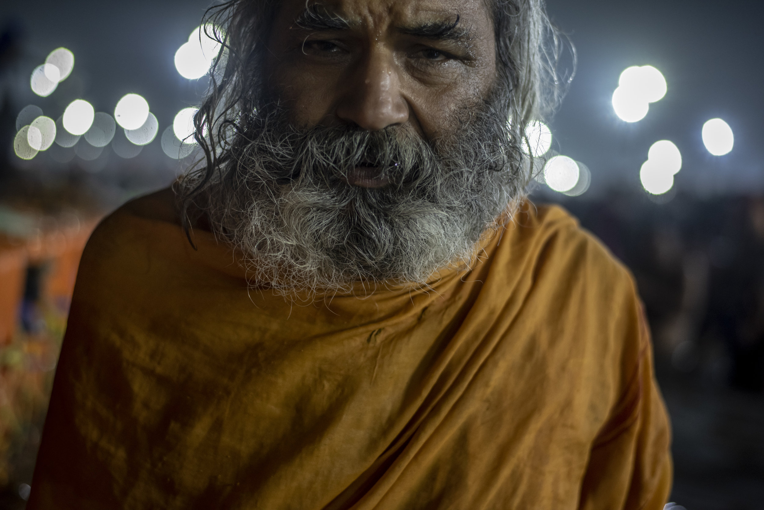 Sadhu stands stoically in the cold waters of the Ganges for almost an hour