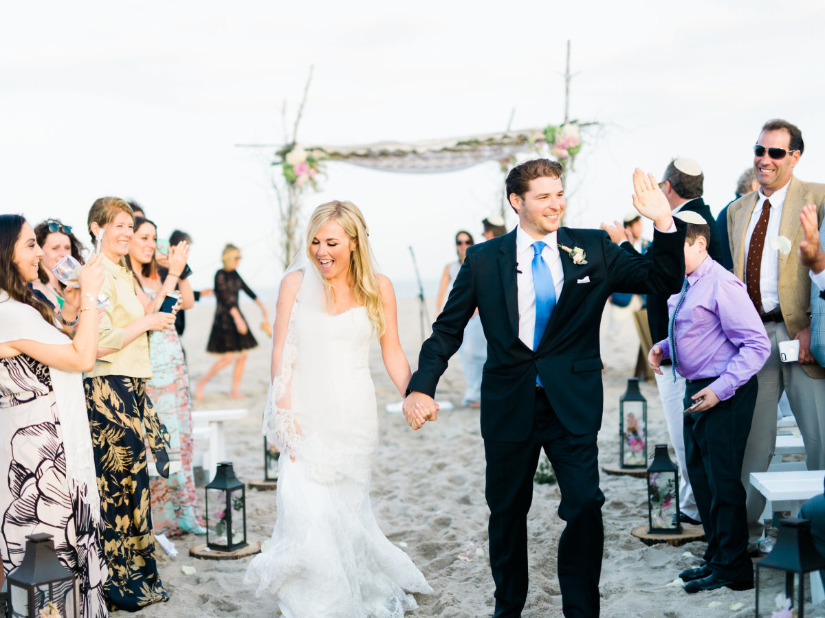 Beach ceremony under natural canopy