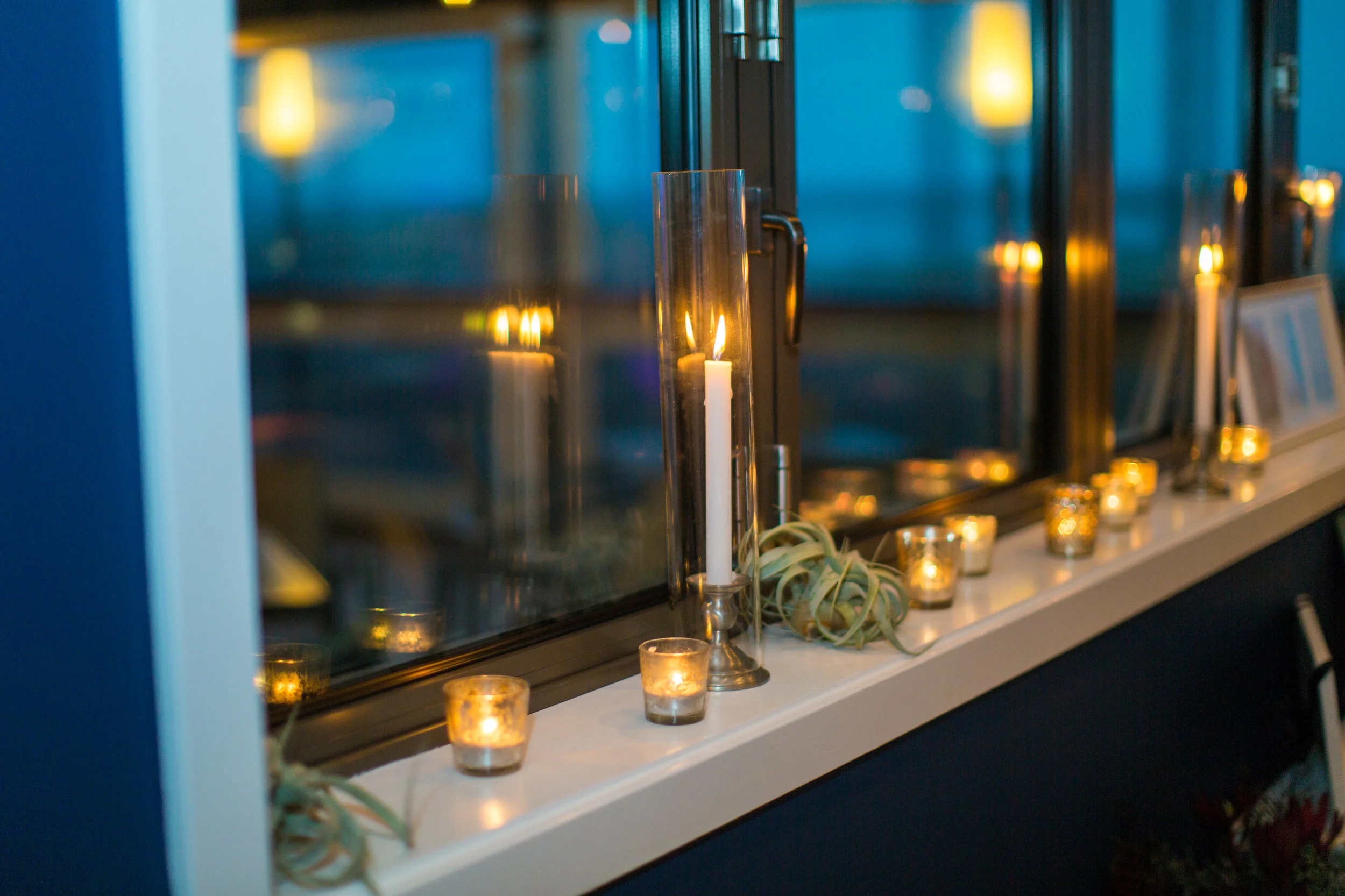The Windrift has a ton of windows to create its sense of openness in the room, and to give a great view of the beach outside - but when night comes, nothing feels more romantic than tons of candlelight reflecting off the windows for double the glow! 