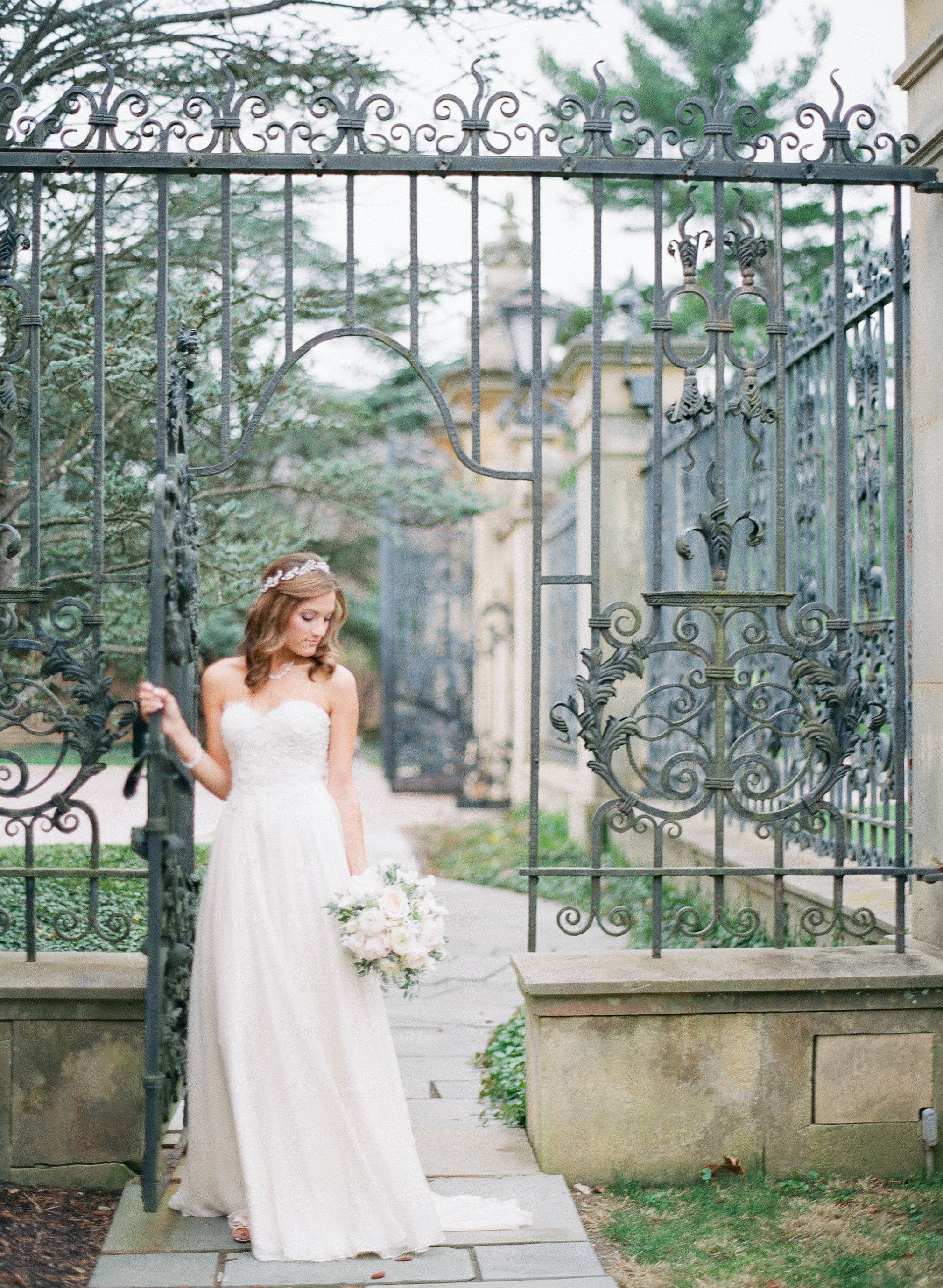 Sarah's bouquet was a plethora of pure white blooms - garden roses, peonies, ranunculus, and sweet pea were made to look even more stark against touches of seeded euc, dusty miller and hints of greenery. 