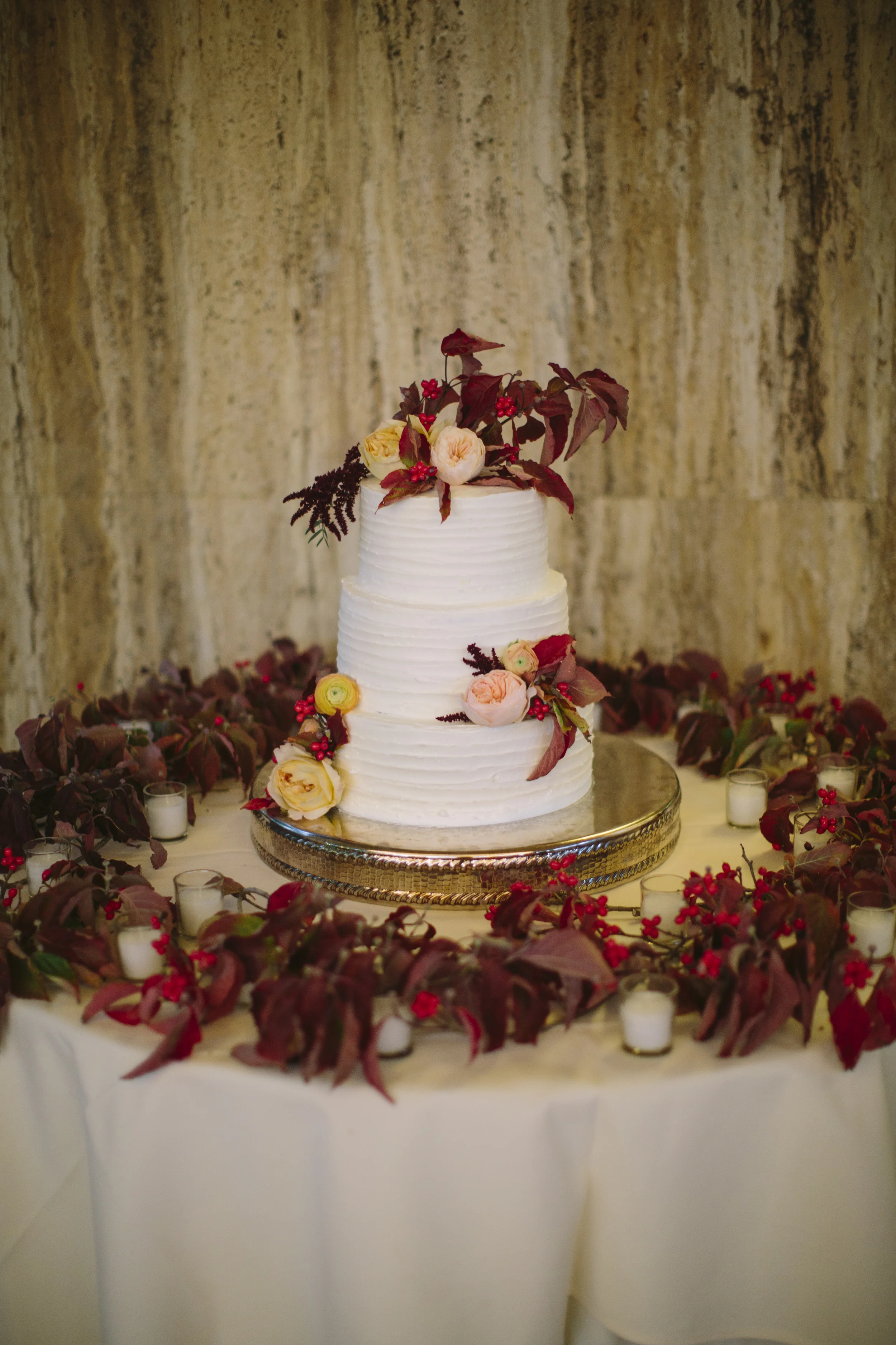 wedding cake with fall flowers