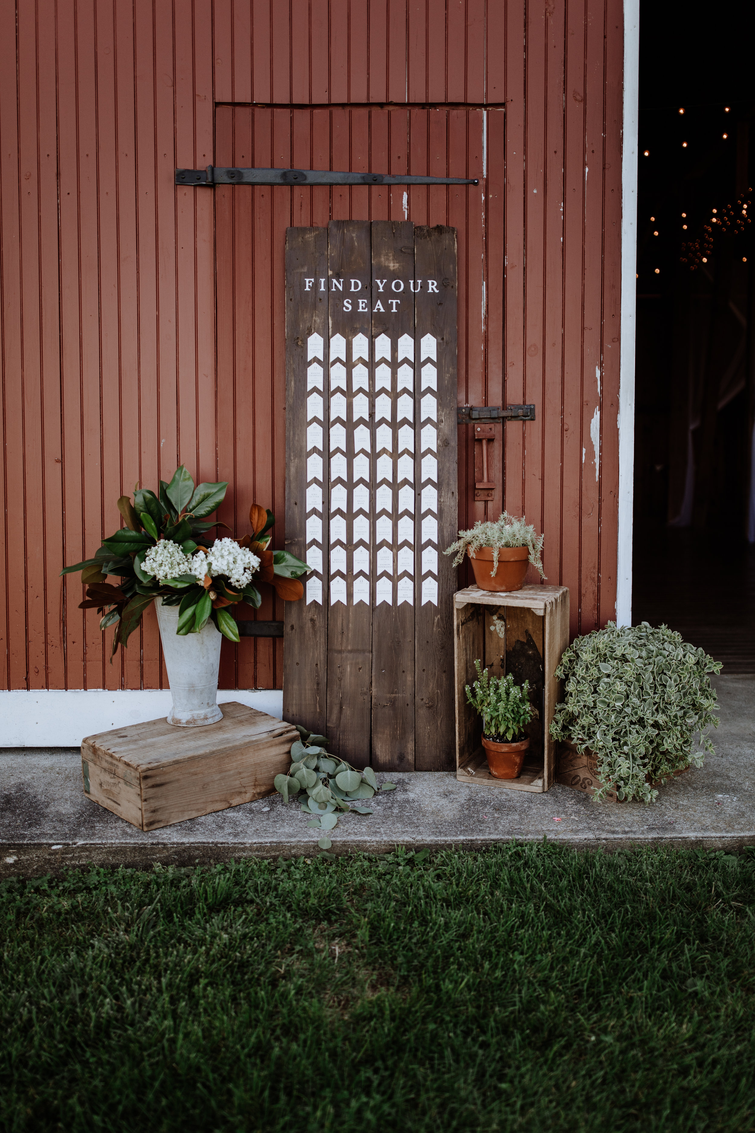 escort card display outside barn