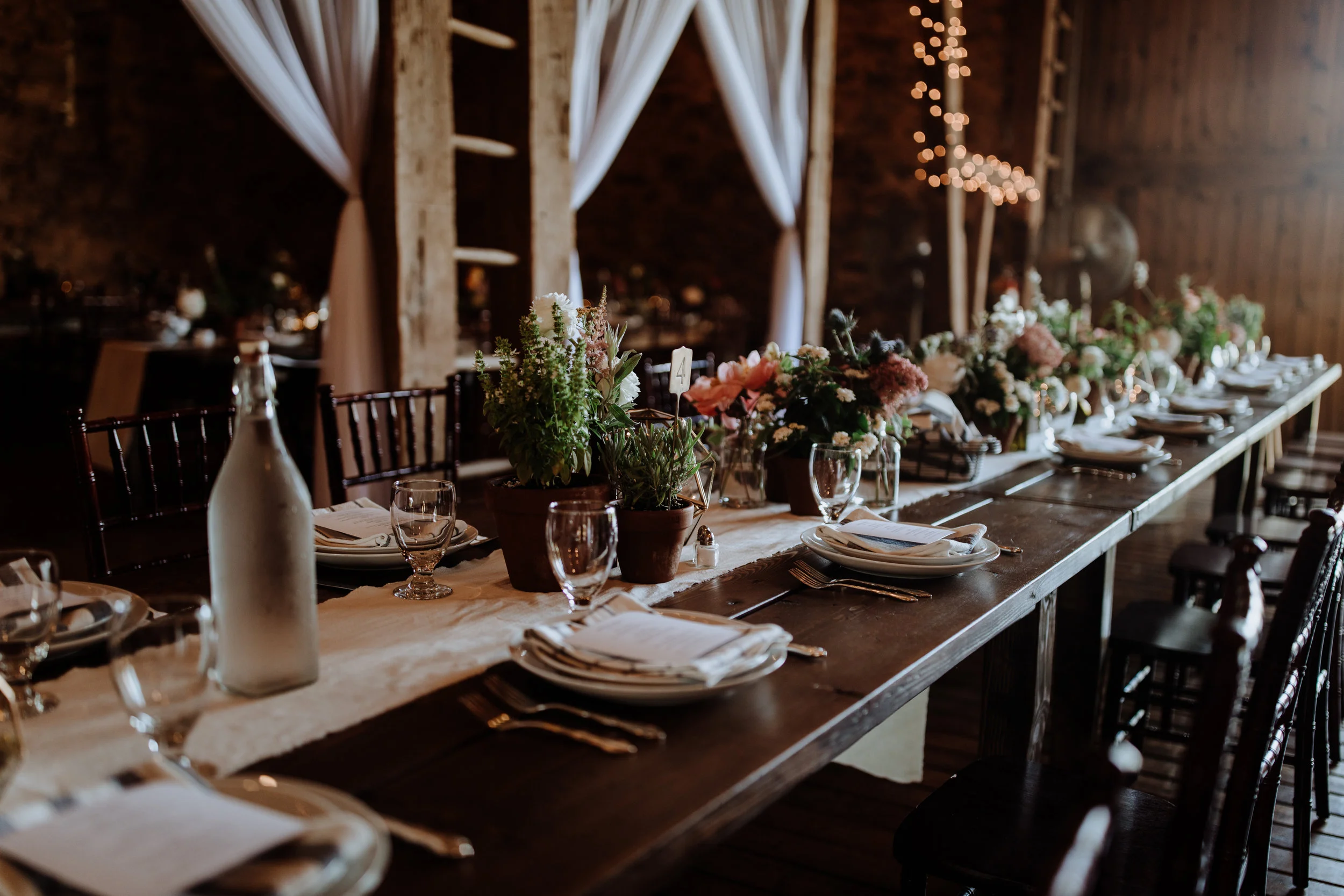 farm tables with potted plants