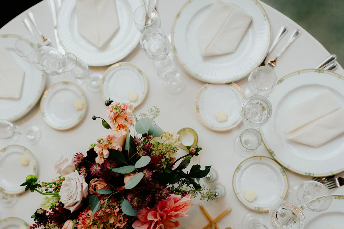 lush floral centerpiece with candles