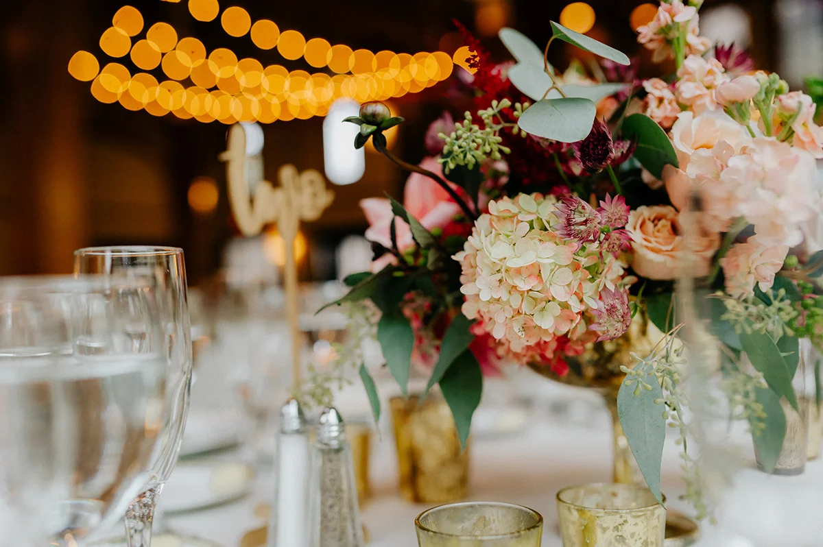 floral centerpiece in gold compote