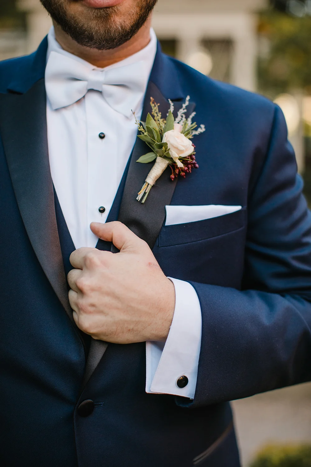 coordinating boutonniere with berries