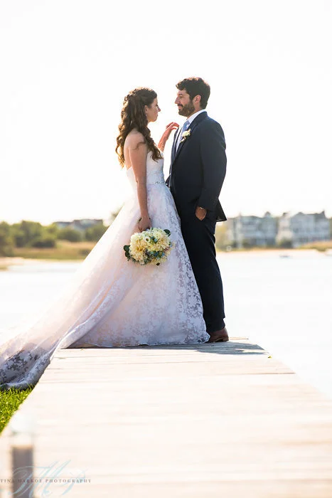 bride and groom on the dock
