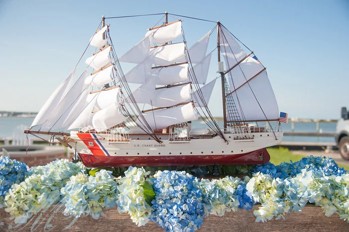 model ship with hydrangea