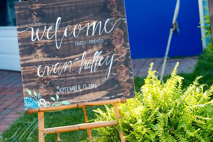 wooden welcome sign