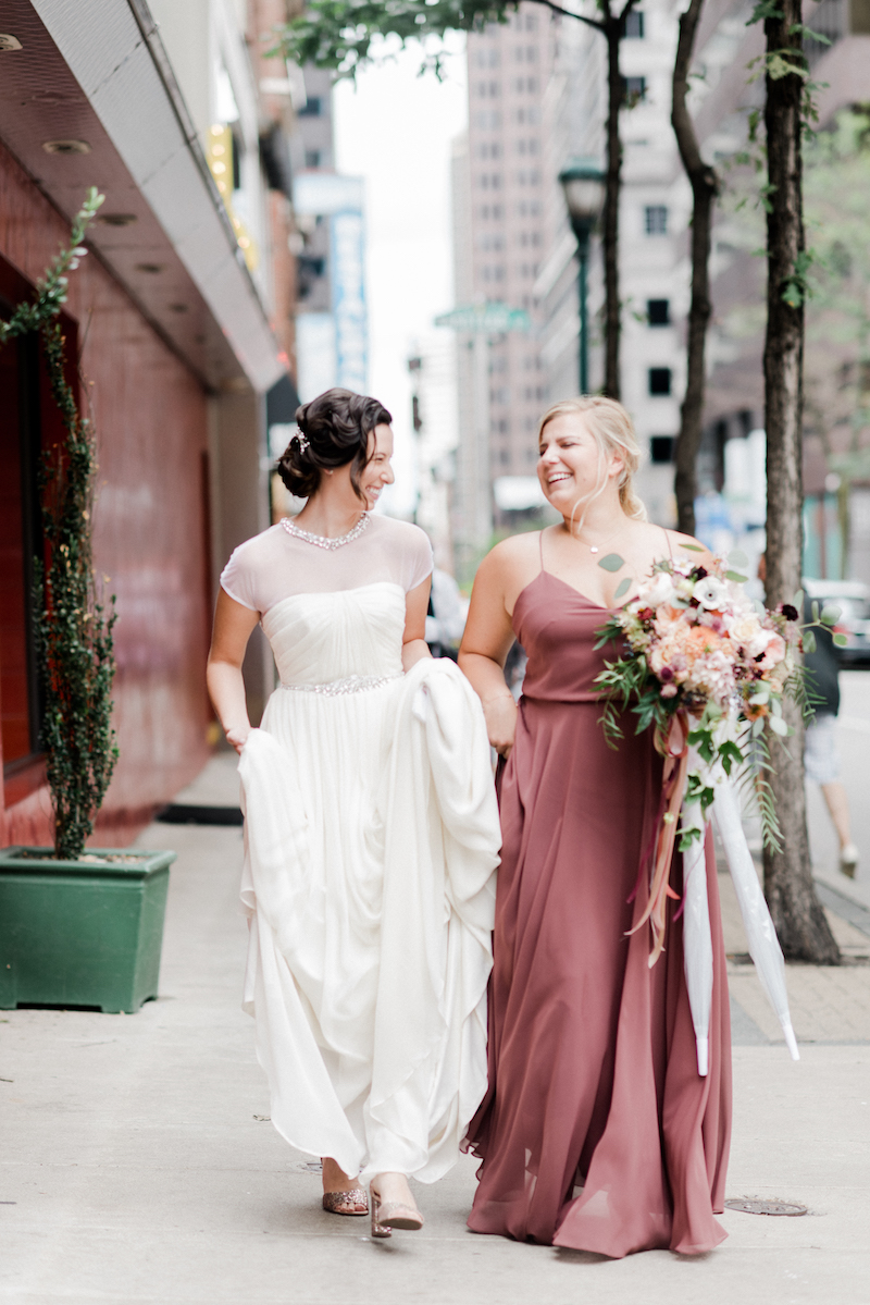 bride and bridesmaid posing