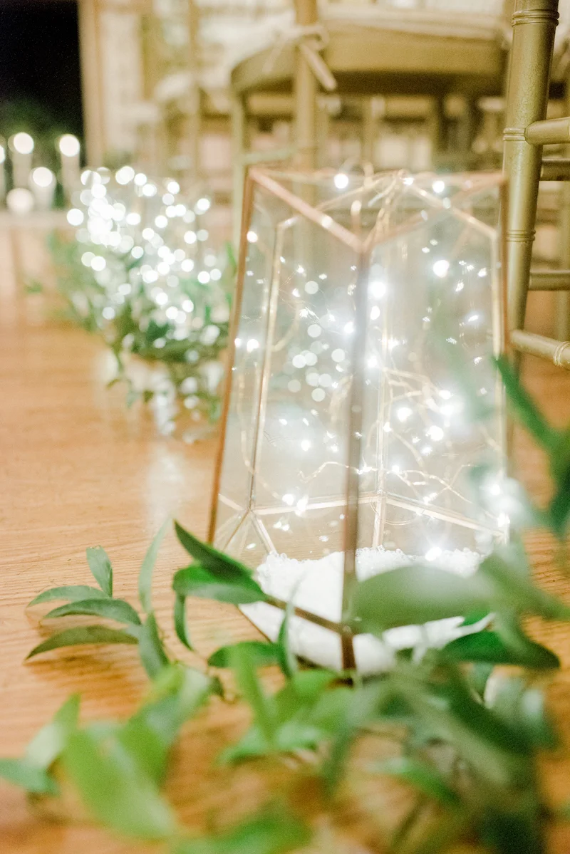 elegant ceremony decor with fairy lights