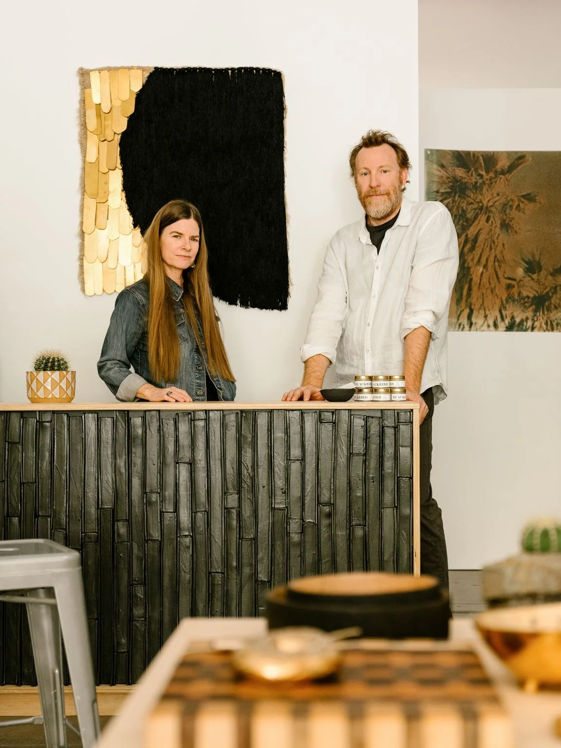 Jamie and Brian Bosworth at their new Palm Springs art boutique, BKB Handcrafted (Photo: Lance Gerber/DESERT magazine)