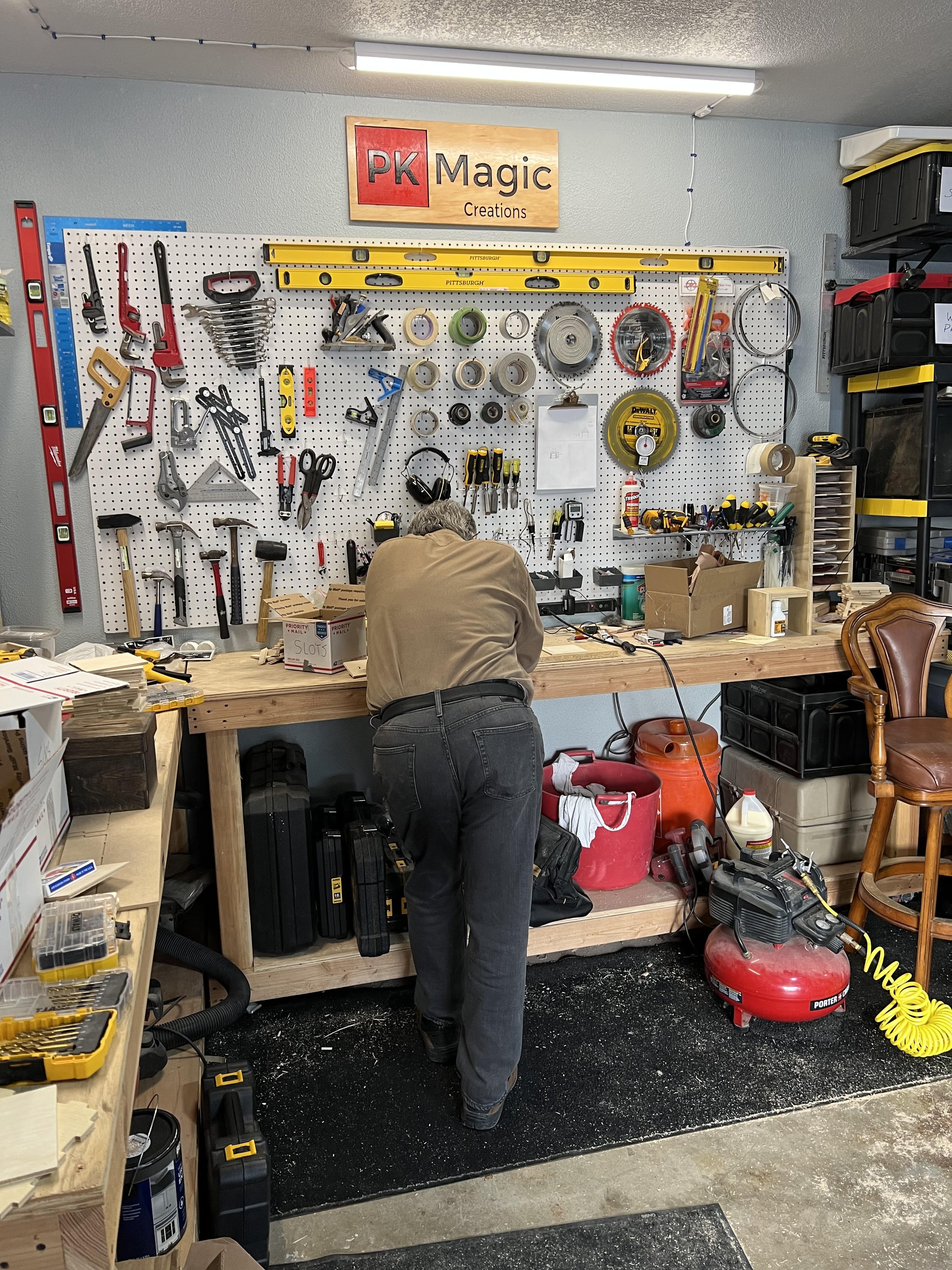 Patrick working out a solution at the PK Magic work bench