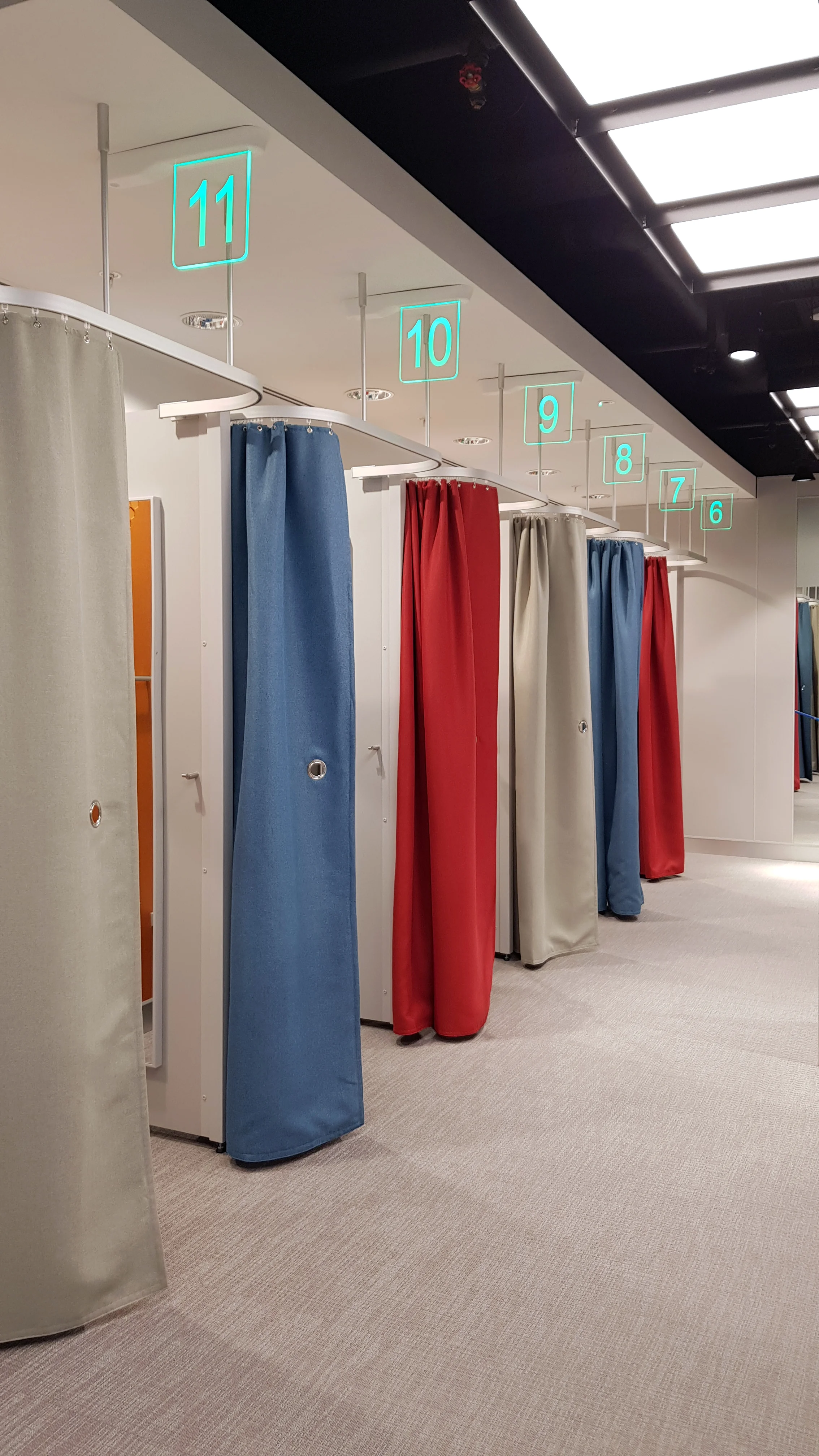 LED illuminated changing room signage, activated by proximity sensor
