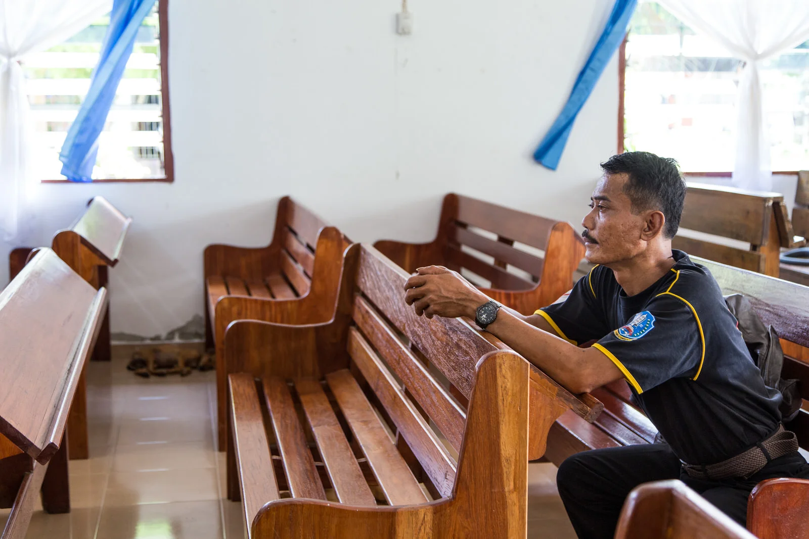 A portrait of Pak Jhon before making a testimony at church.