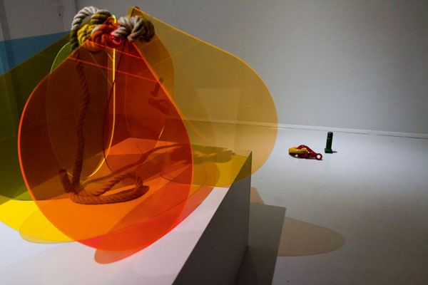 Studio photo: Hulda Rós Guðnadóttir. Sculpture: Six plexiglass plates, 3mm thick, colours variable, dimensions boya shaped 50 x 60 cm, hemp rope. Ready-mades: Variable size metal objects painted with various coloured ship paint. Found in the harbour.