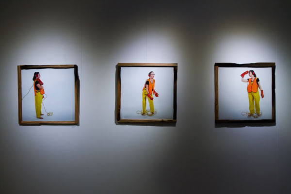 Installation view. 'Artist as Worker'. C-print: Three 50x50cm C-prints framed in crumbling 100 year old dock floor wood. Photo: Hulda Rós Guðnadóttir.