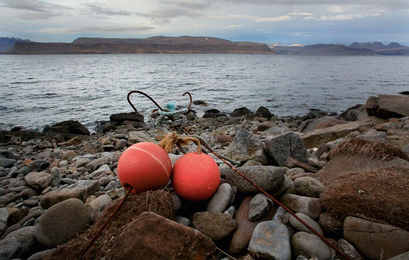 Buoy still life on a beach.