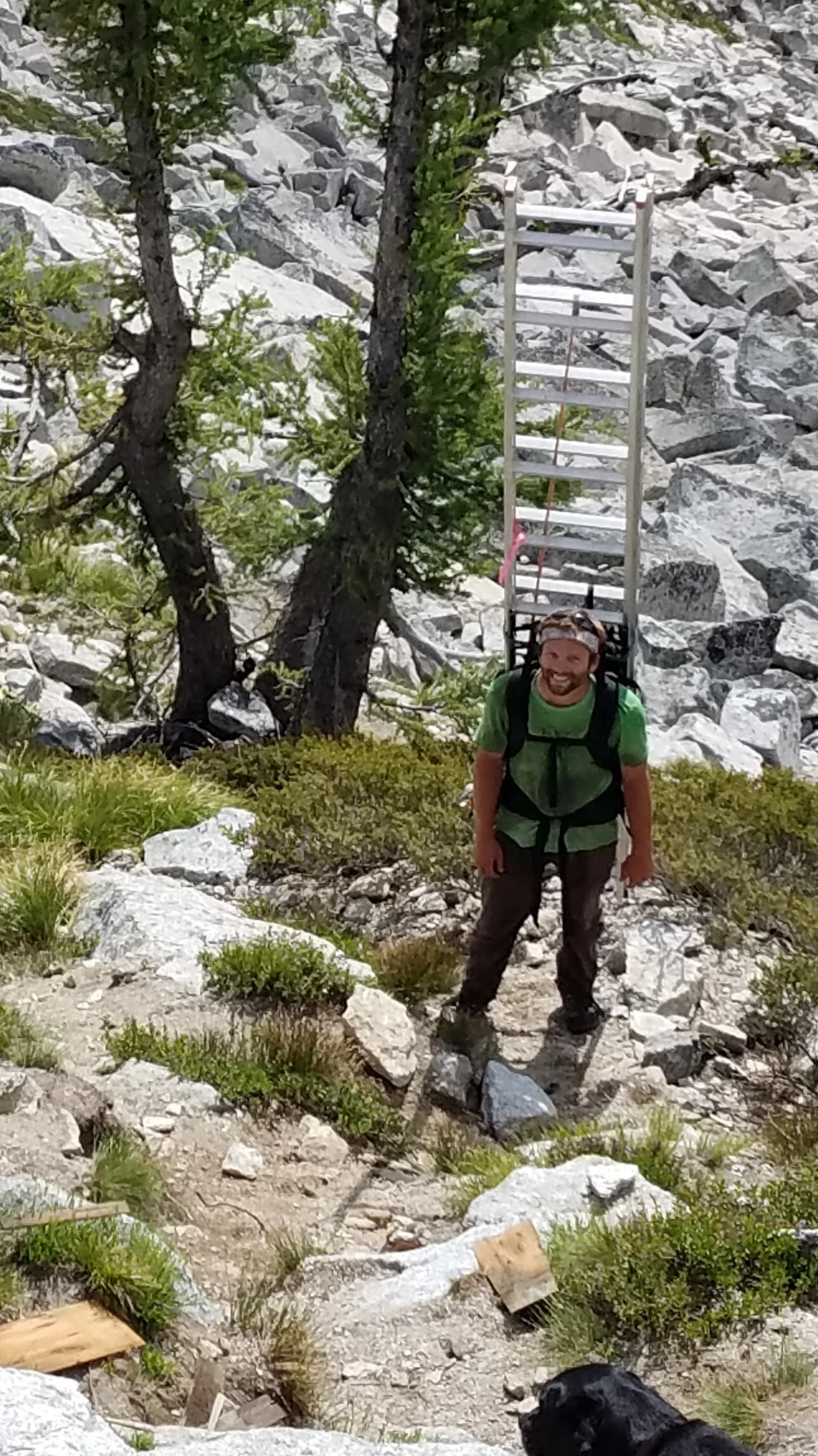 Conner carrying the ladder. Five plus miles - 3,000 ft elevation gain.
