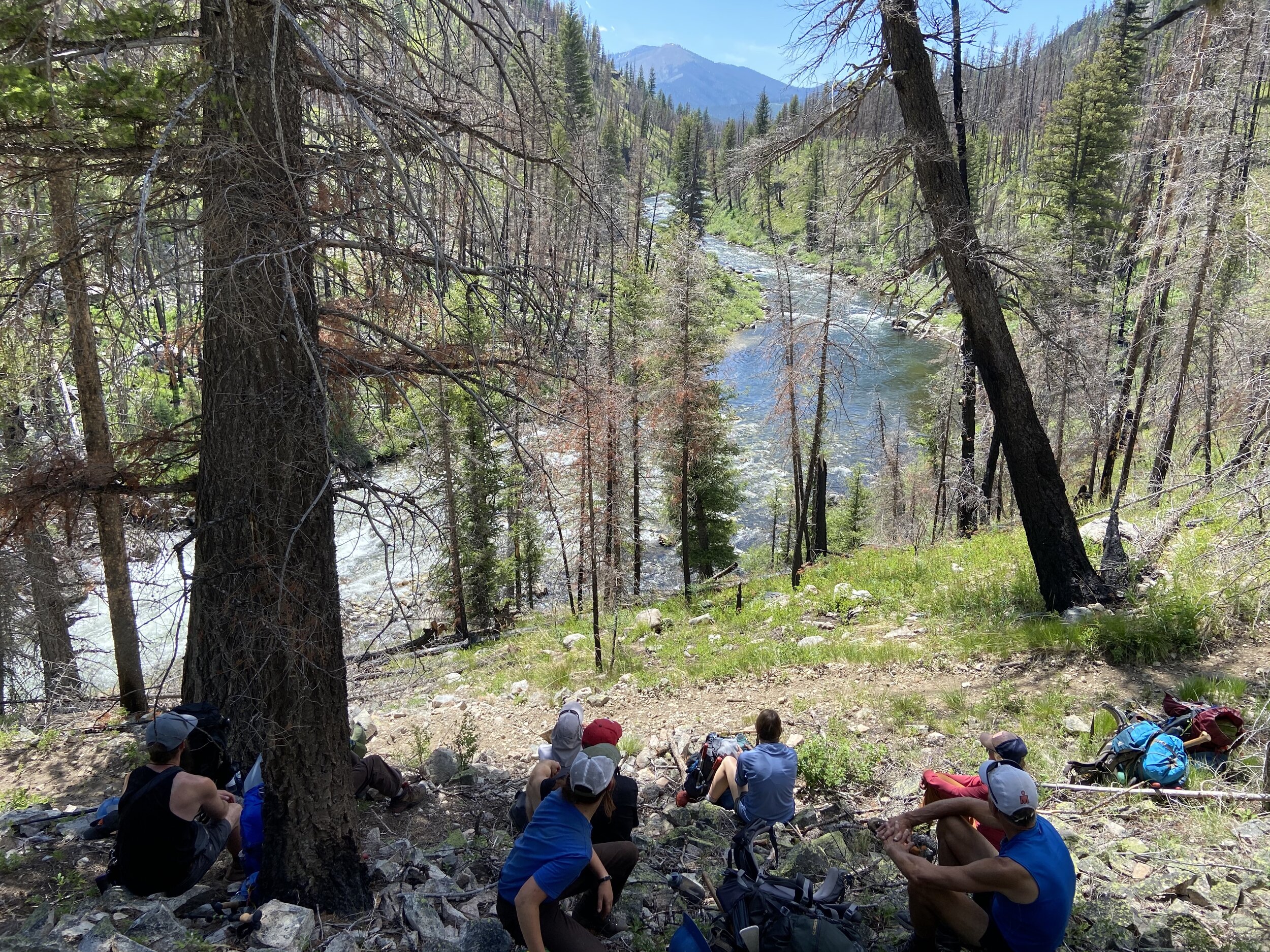 Volunteers and SBFC crew members stop for a lunch break overlooking Velvet Falls on the Middle Fork of the Salmon River.