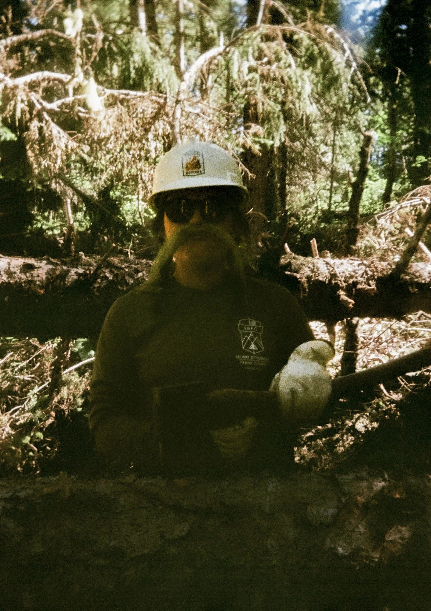  Crew Lead Emma Cianek looking the part with the help of some Old Man’s Beard in the Selway Bitterroot Wilderness (Tr #486). 