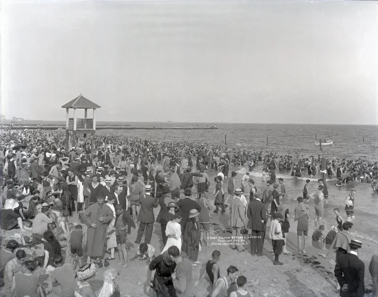 Vintage picture of summer vacationers in Coney Island.
