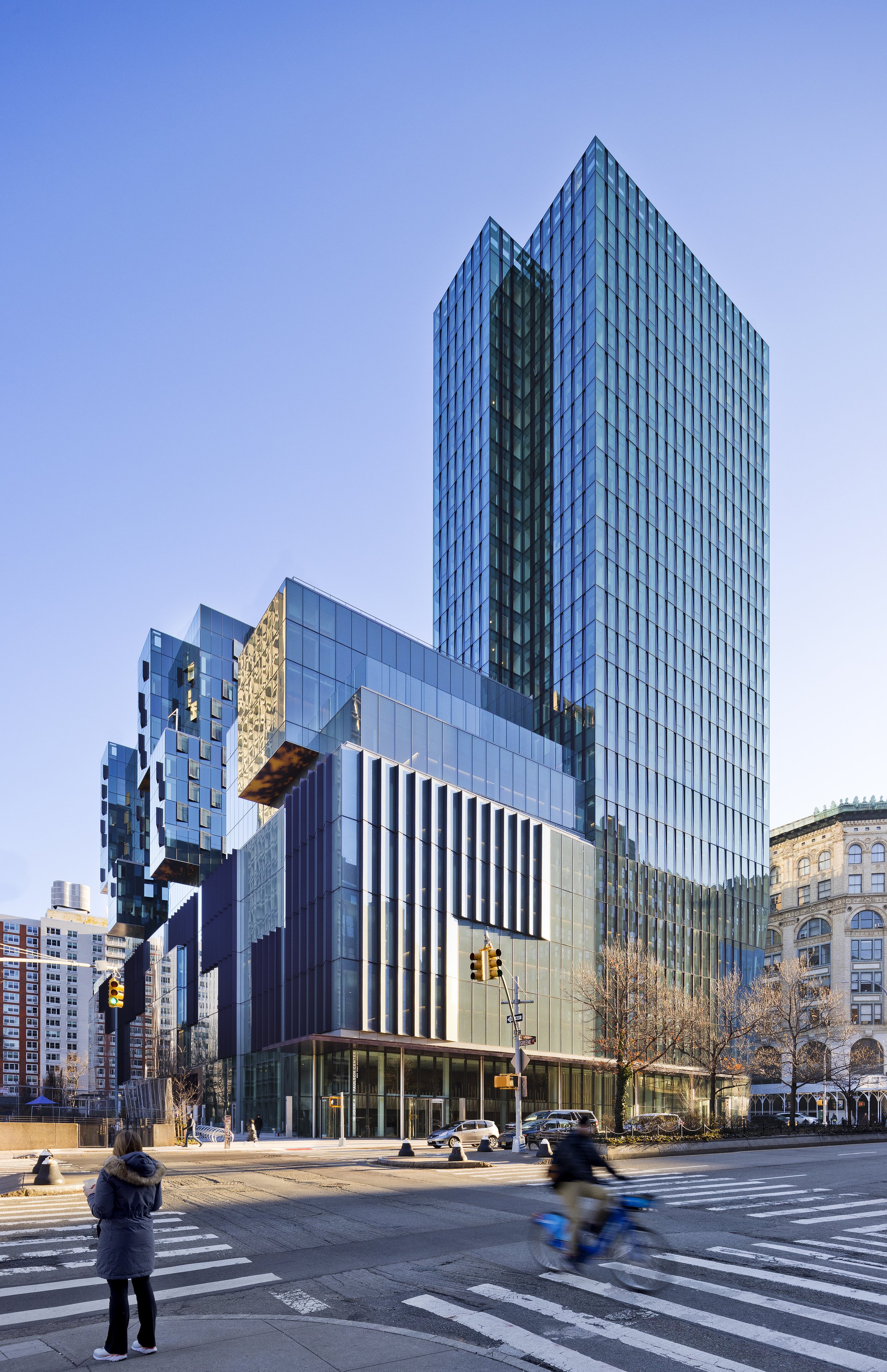 15.NYU Paulson_EXT_Full Building_SW_Houston Street_Vertical_Morning.jpg
