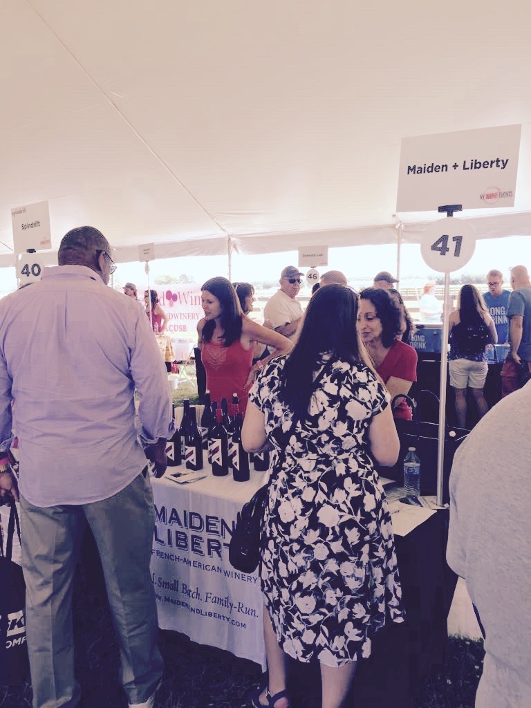 Our team serving our French-American blended wines at North Fork Crush 2019 in Long Island, New York.
