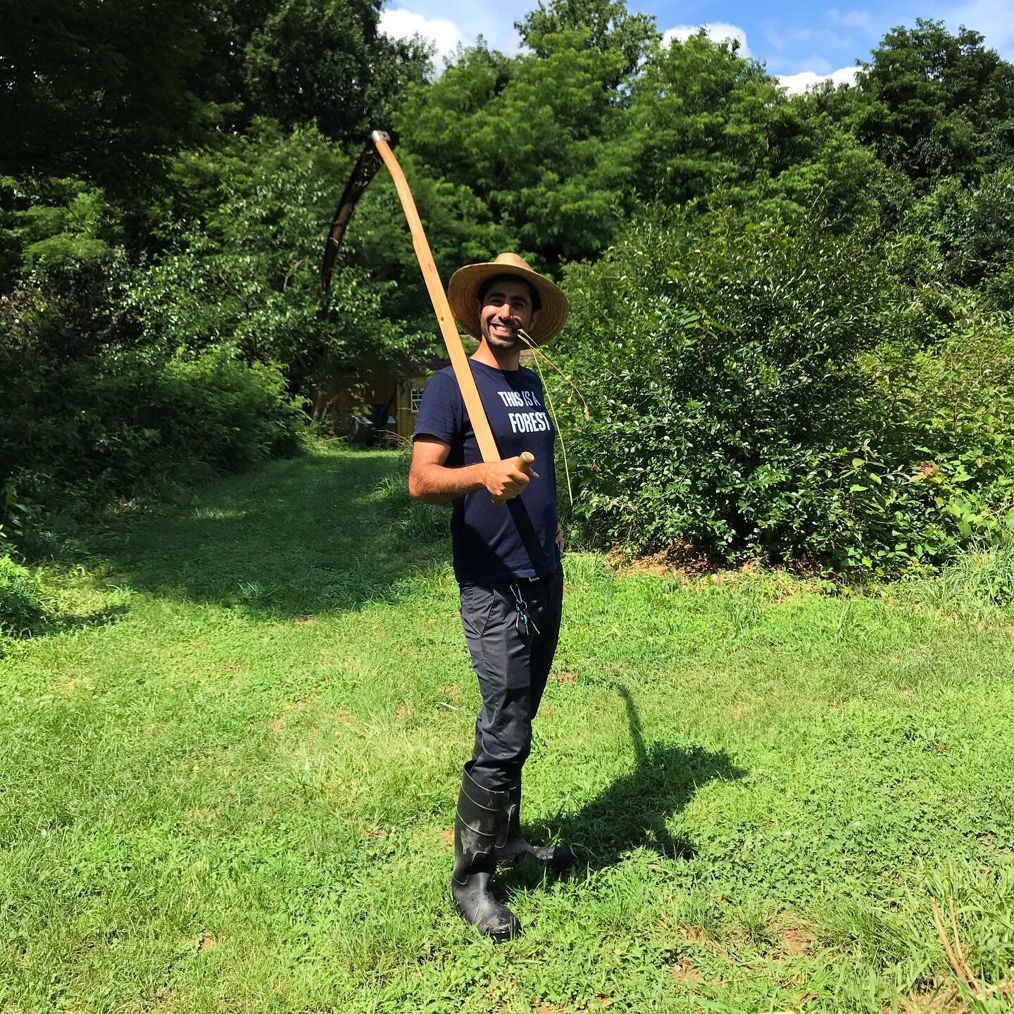 Yeah, that&rsquo;s right, we look like farmers over here. #scythe #strawhat #chewingonwheat?  #foodforest #forestgarden #farmerlife