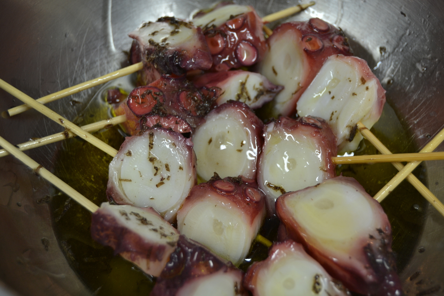 Grilled octopus bathed in fresh black truffles is a favorite tapa here.