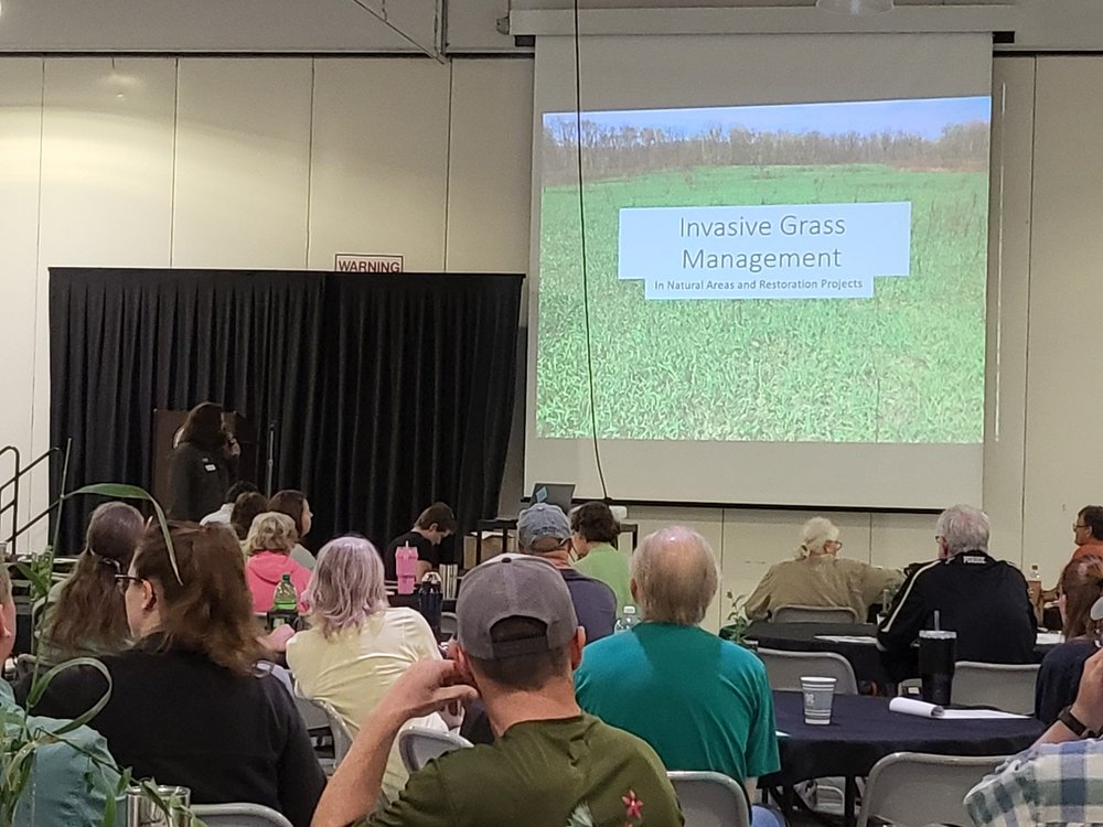  Bob Easter, Niches Land Trust, discussing invasive grass management  