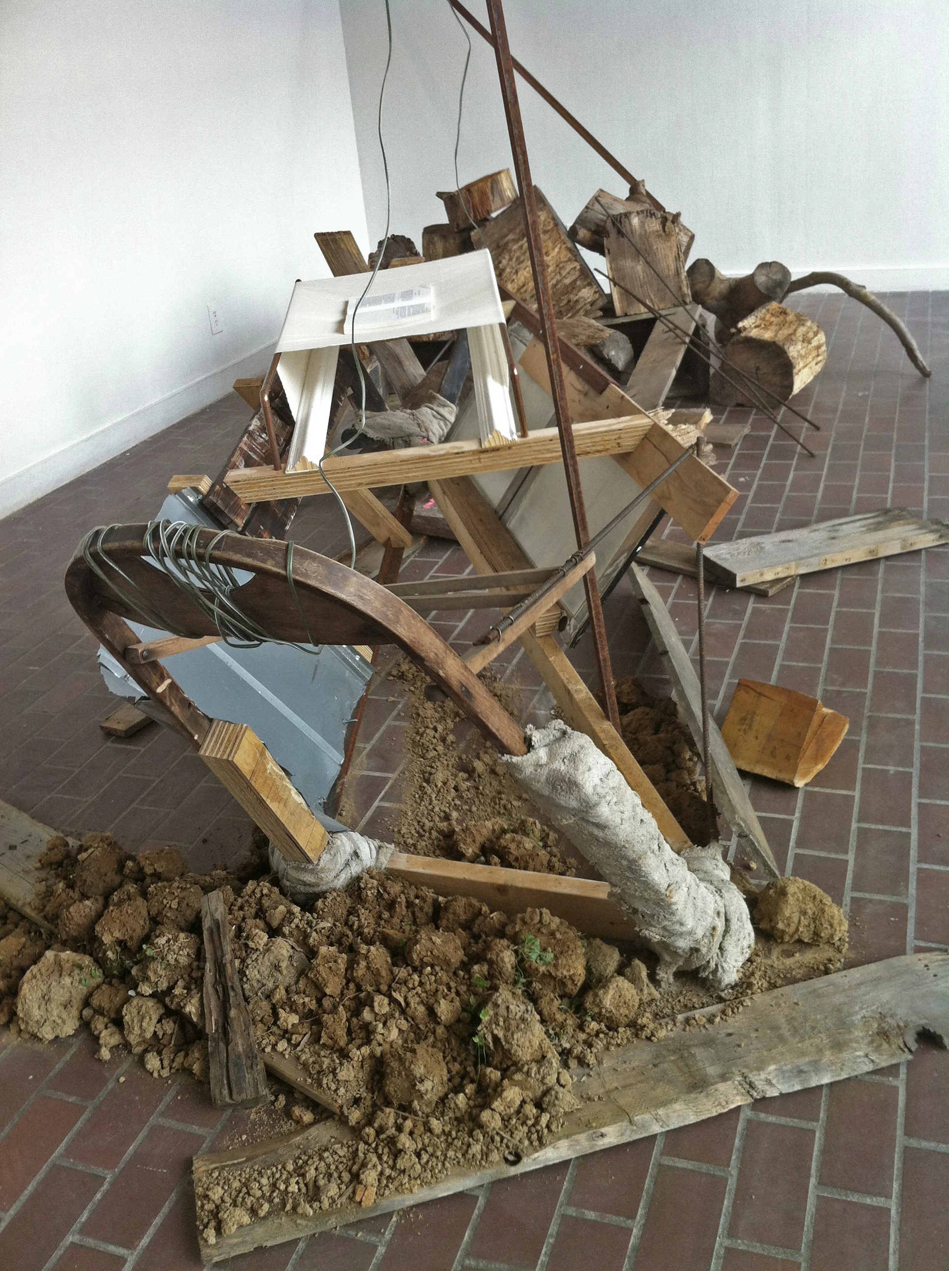 The Right to Work (installation view) Wood, steel, NC red clay, tobacco, roofing tar, wire, textiles, and concrete Dimensions variable, 2015