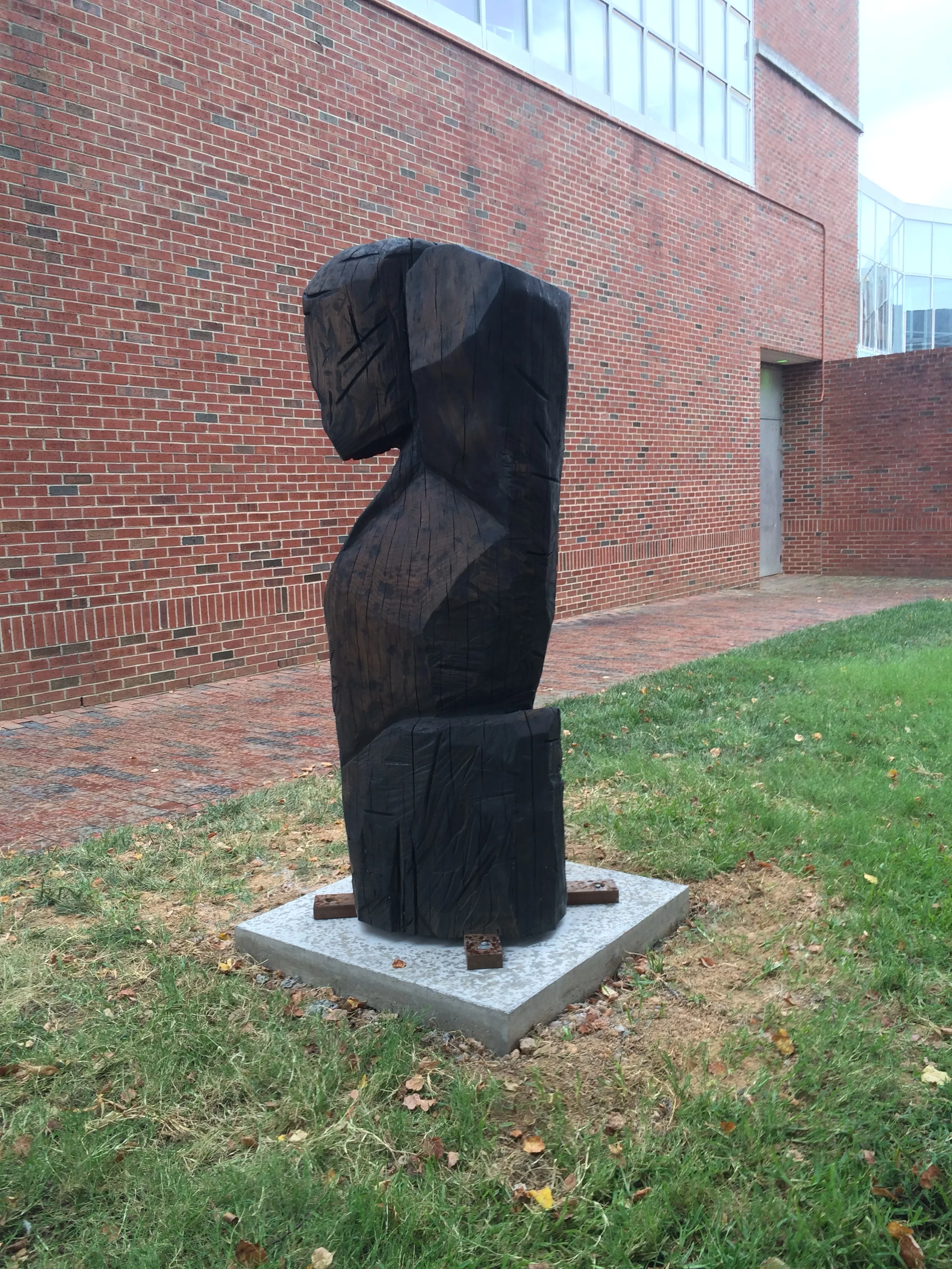 Totem n. 39 (For NC Woodworkers) , installation view NC white oak, graphite, and tung oil 32 inch diameter, 72 inches tall, 2014-15 Commissioned by UNC-CH Art Department