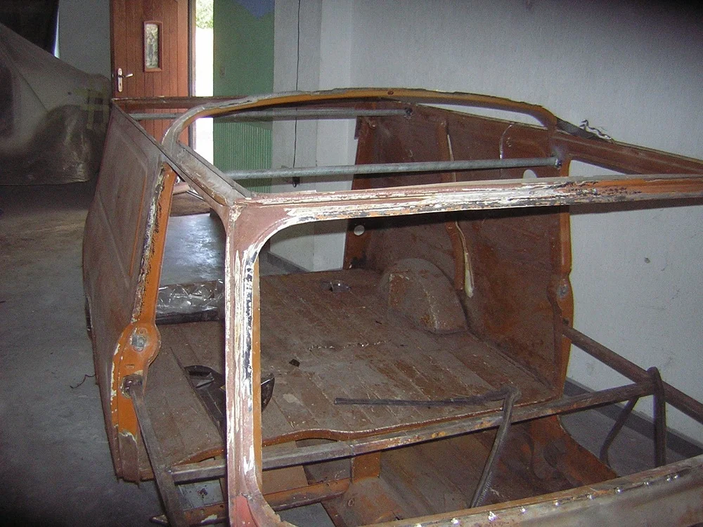 Rusted Roof of Mini Van