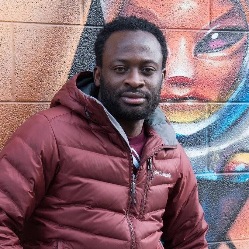 Oliver, originally from West Cameroon, joins our team as our full-time Casa host. He has a positive attitude, easy-going nature, a desire to make others feel comfortable and of course a big, beaming smile! He is a joy to be around. In exchange for free room and board Oliver helps out in the evening hours with our guests and volunteers. He truly cares about each and every person that passes through our home. One of the things he does to make our guests feel welcome is by preparing homemade meals that are incredibly delicious. Oliver currently is a team lead for the cleaning crew at the hospital. In his spare time he plays in table tennis tournaments and is the reigning champion in Denver! You would never know about his many victories because he’s so humble. But don’t let his quiet demeanor fool you—he’s a competitive athlete with a desire to do his best… and he always does.