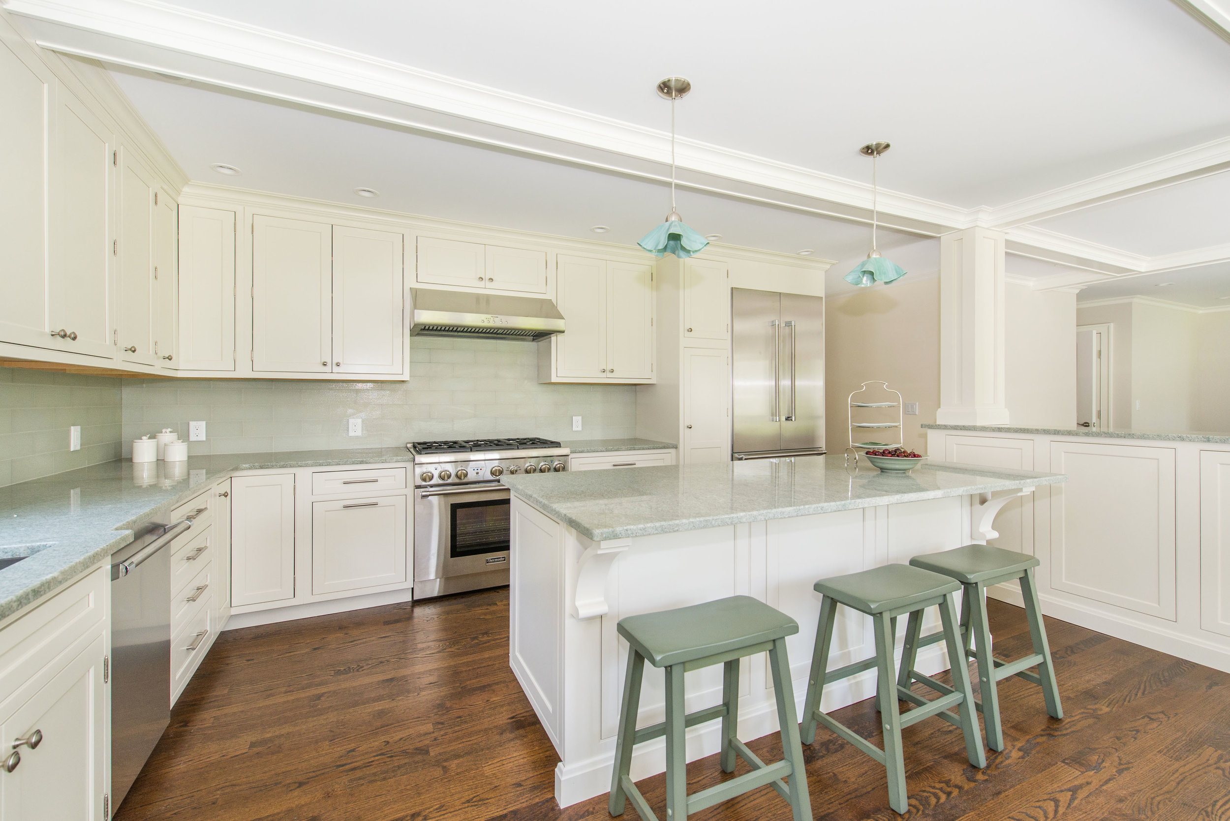 New Kitchen features inset Decora Cabinets, Energy Star Thermador appliances and Costa Esmeralda granite countertops