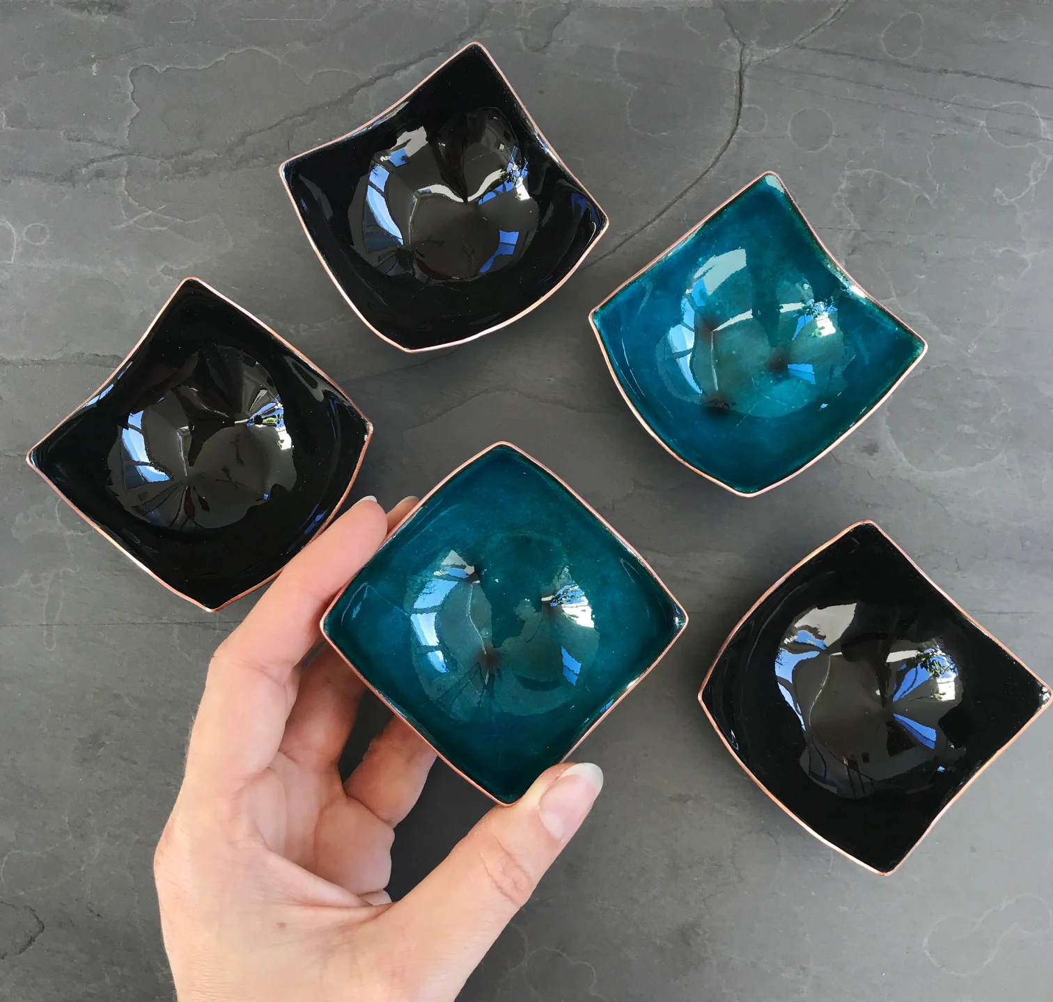 black and turquoise salt cellar enamelware bowl