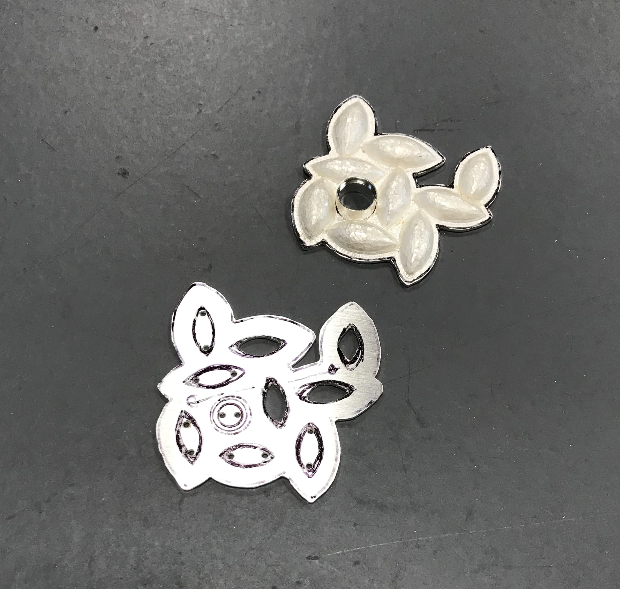 cuting parts for custom silver brooch_CG Sculpture Jewelry.jpg