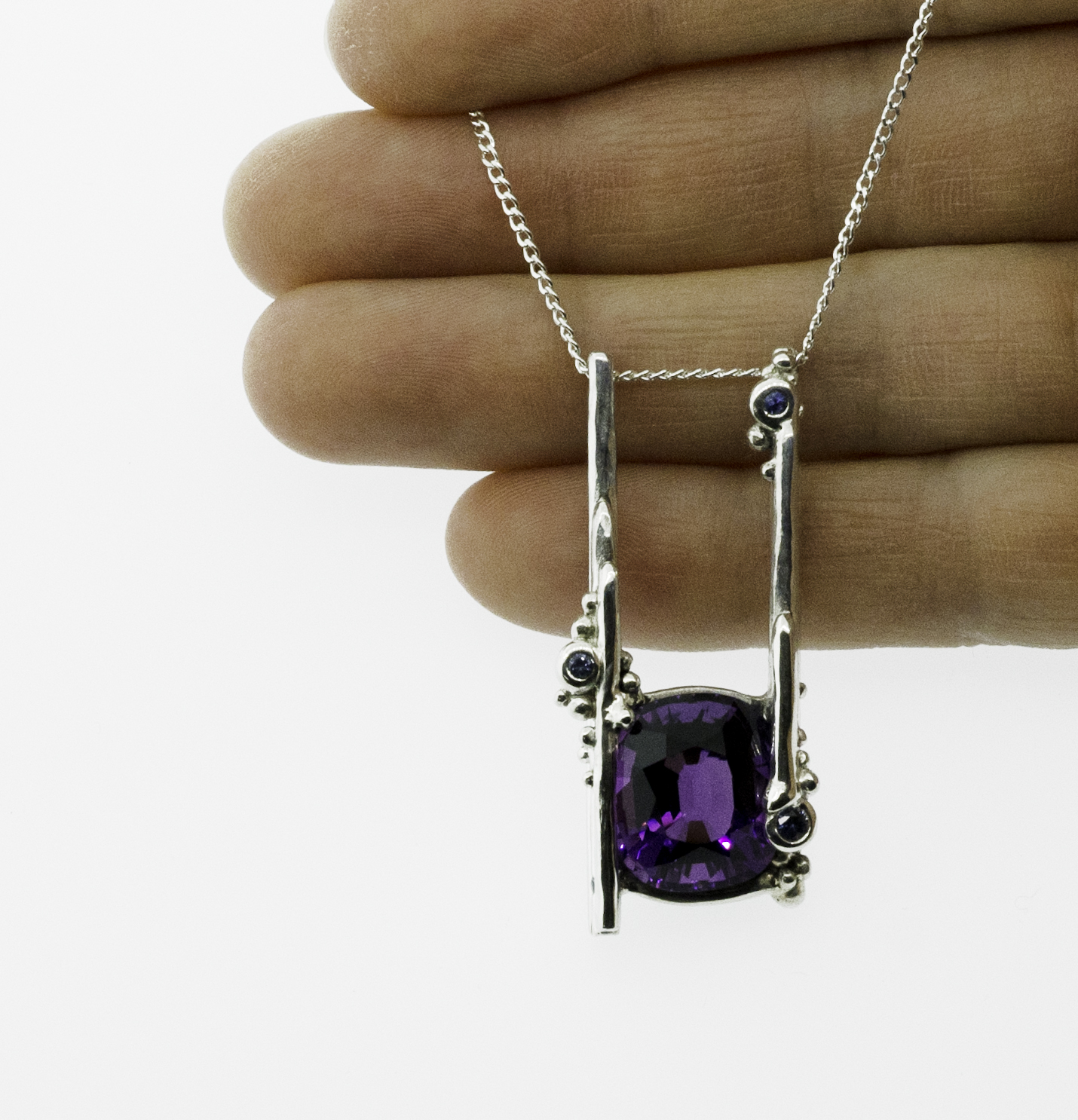 John asked me to make this amethyst pendant for his wife, Katia to celebrate the birth of their first child. To them, this necklace tells a story of love and connection. Read more about the inspiration and design process behind this piece here .