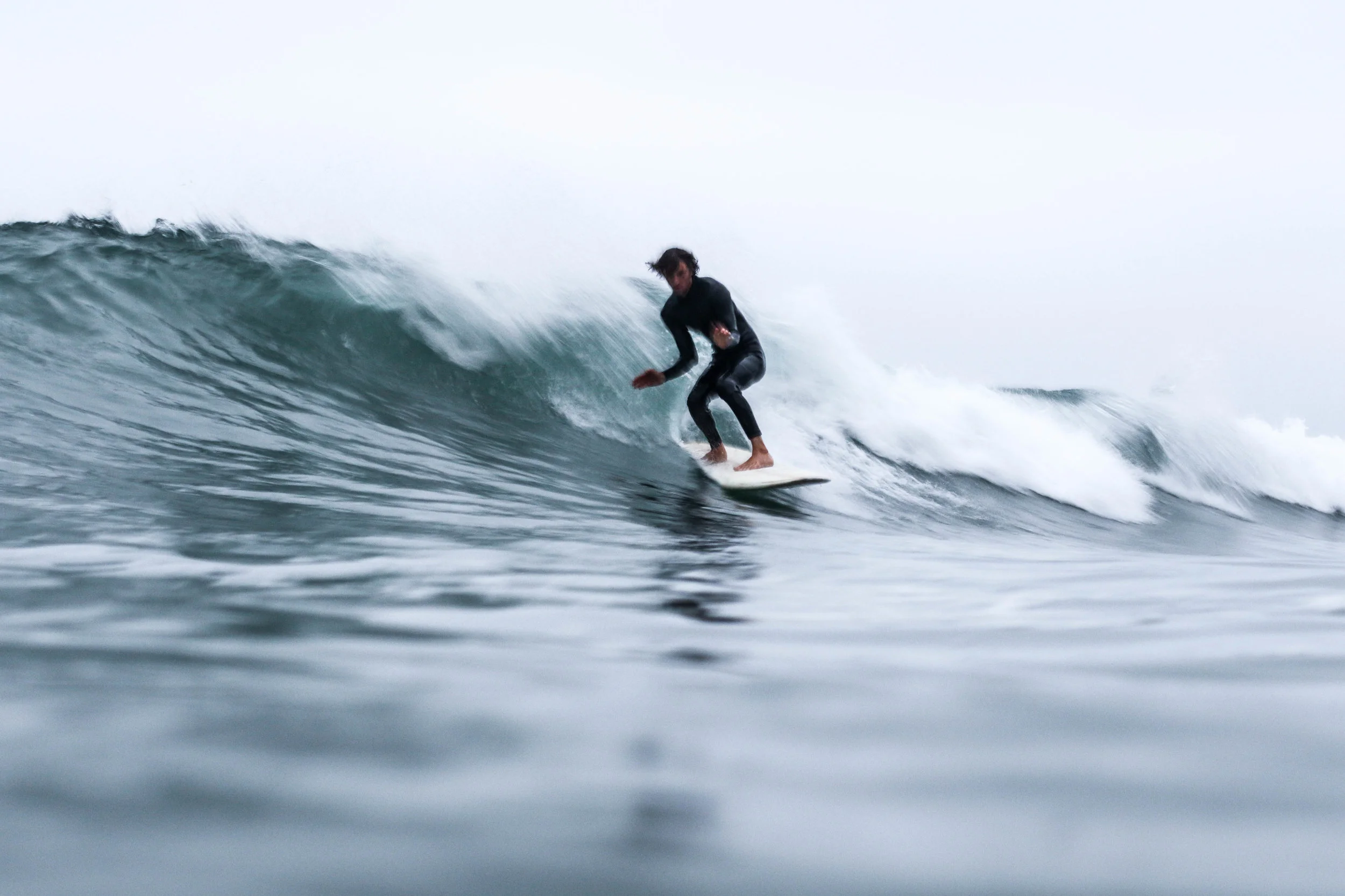 Breaking Down the Differences Between Surfing and Paddle Boarding