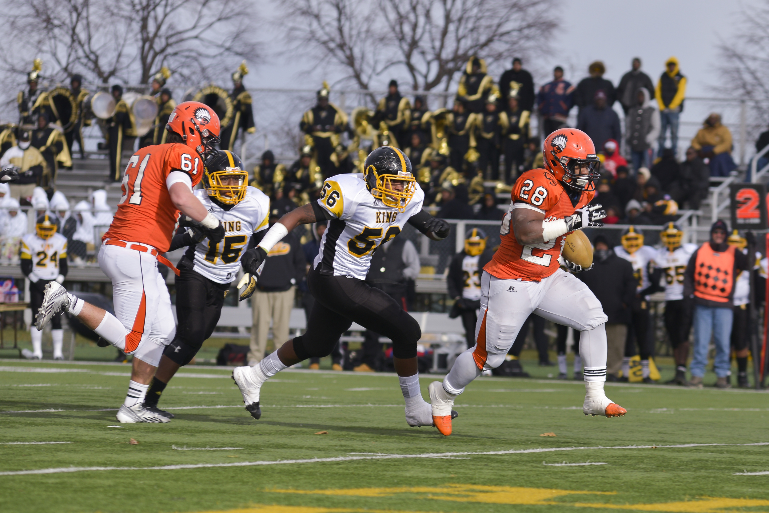 Brother Rice RB Brian Walker runs through a hole in the Detroit King’s defense to score a touchdown during the MHSAA State semi-final game. In the first half alone, Walker had 10 carries for 93 yards and 4 touchdowns for Brother Rice.