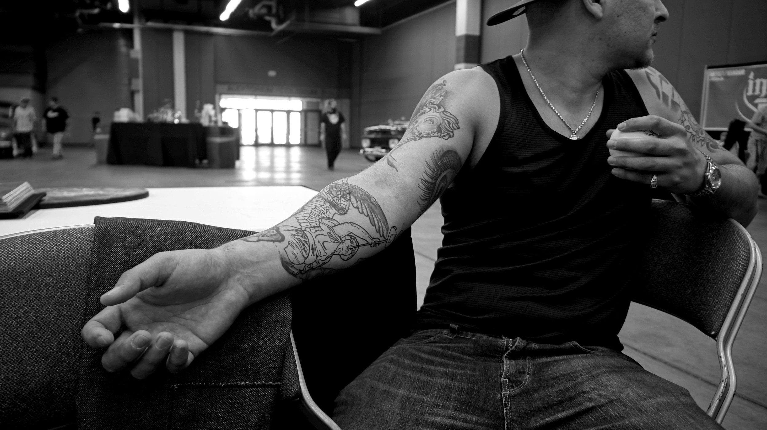 This is my friend Nick, I took this photo on the first day of the convention. The plan was to add an angel to this sleeve of his that we've been working on for quite some time now. We got there early enough for me to get the stencil on and get my booth set up before having to double back to Dallas. I realized that I had forgotten my tattoo machines! We decided to grab a quick bite to eat as well, to get the day started off right 
