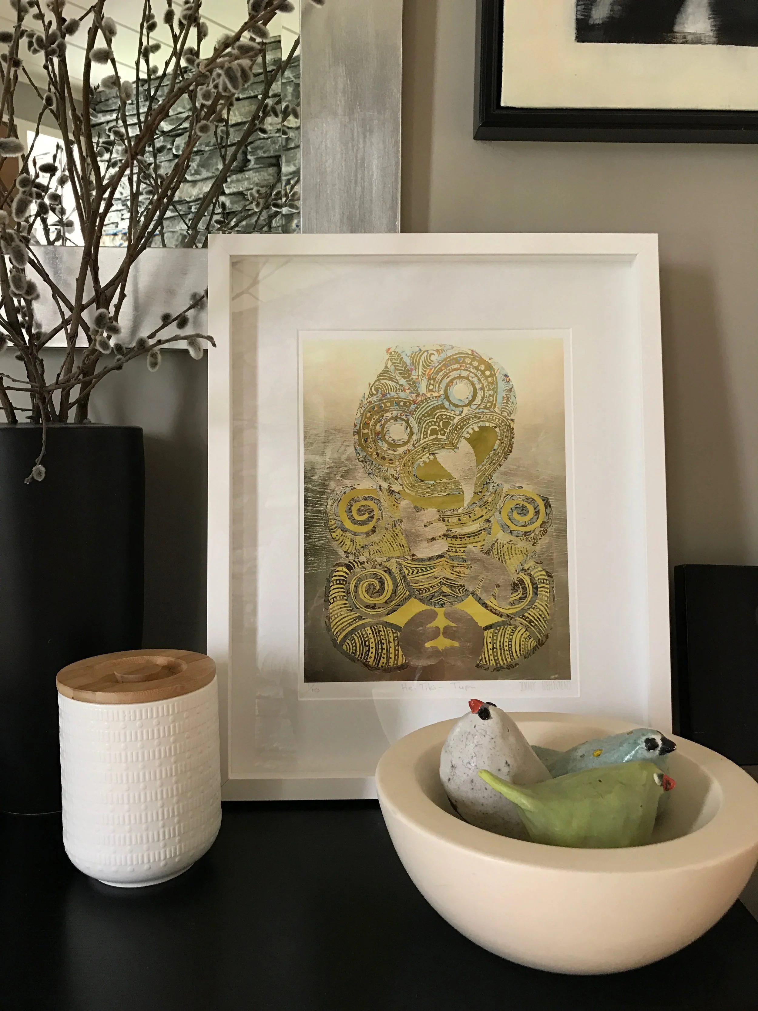 HEI TIKI - TUPU (new growth) FRAMED PRINT A special edition of 10 only Hei Tiki works on paper. The works are Giclee printed on beautiful Hahnemuhle art paper and framed in a white box frame. Framed size is 17" x 21". Each print is numbered and signed. All sold