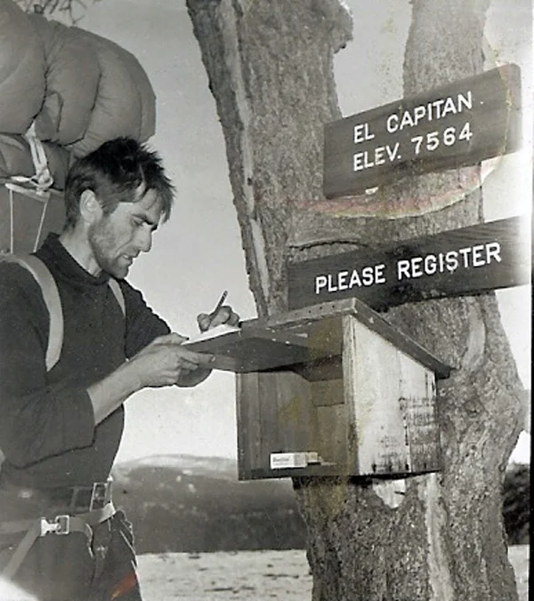 Warren Harding signing the El Capitan summit register after the first ascent. November 12, 1958.