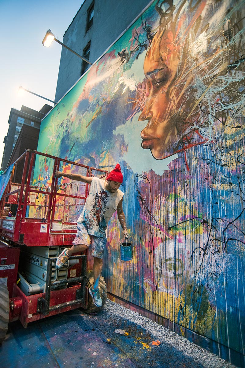  David Choe painting at the Bowery Wall New York. Photo by Martha Cooper. 